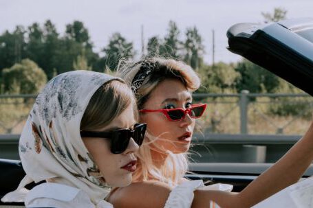 Fashion Guide - Beautiful Women Traveling on a Cabriolet